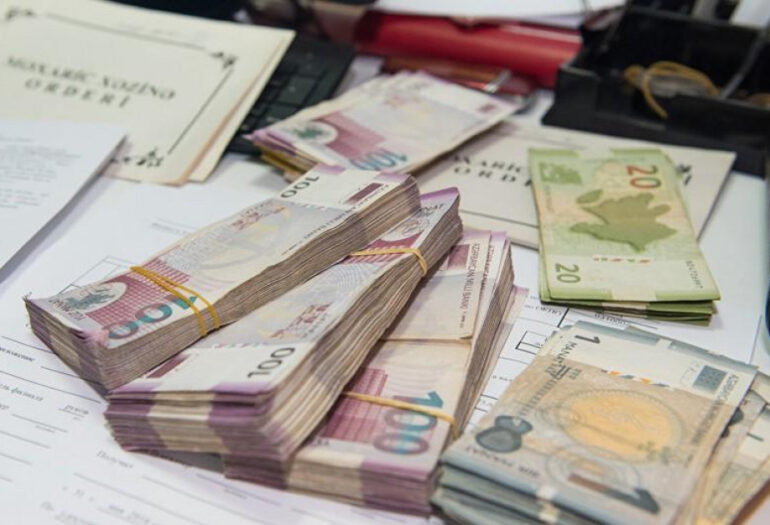Manat 1